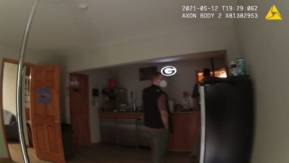 Body camera footage CNBC obtained shows investigators in Zhong's basement, which contains a full bar and a stripper pole.