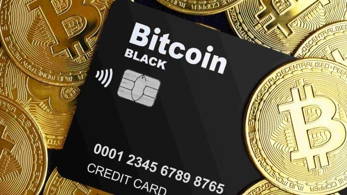 Bitcoin em destaque com cartão black em destaque